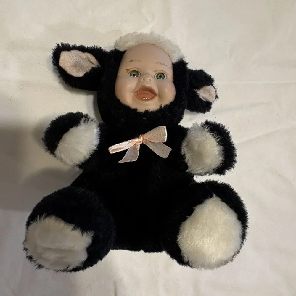 Vintage Rubber Face Baby With Cow Plush Suit
